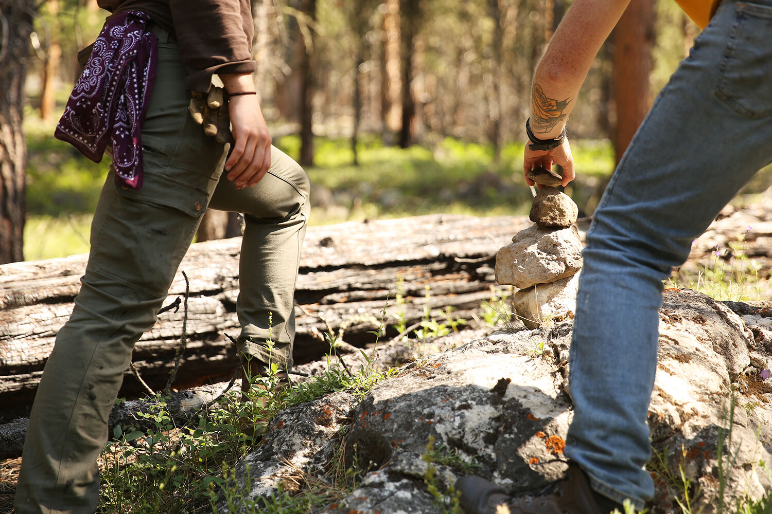 Crew leaders Kylie Lamoree and Blake Stevens make a cairn